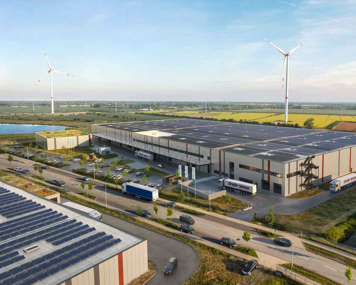 Luftaufnahme der Logistikhalle Hansalinie Bremen - Onebox. Eine große Lagerhalle mit Solarzellen auf dem gesamten Dach.